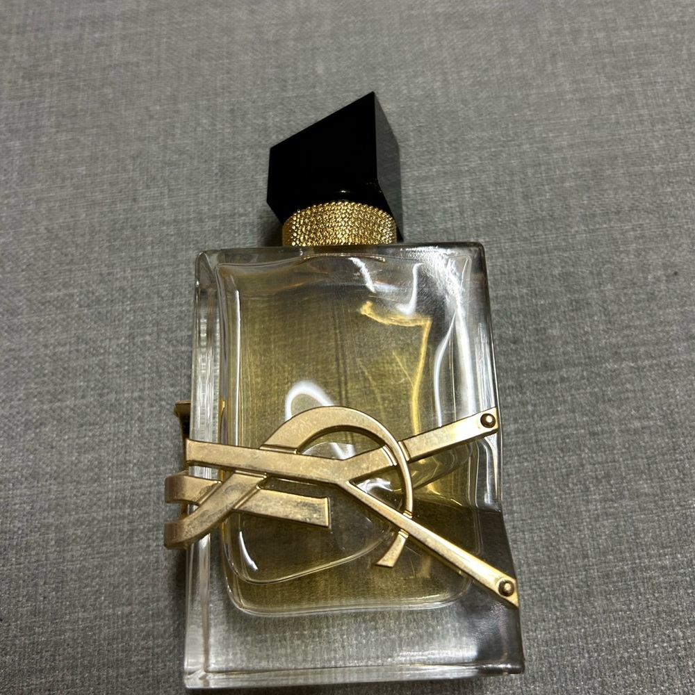 Yves Saint Laurent Gold and Black Perfume Bottle